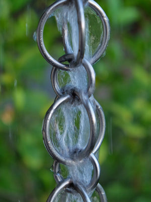 Stainless steel Double Loops Rain Chain with water running through it