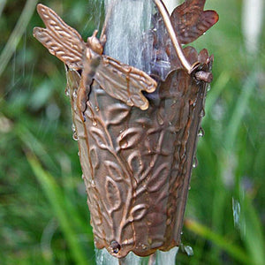 Dragonfly Theme Copper Rain Chain with water flowing through cup