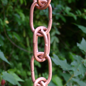 Closeup of copper Extra Link Rain Chain