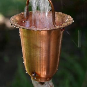 Flared Cups Rain Chain in copper with water flowing through cup