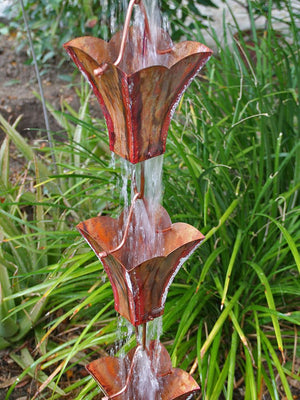 Large Square Cups Aged Copper Rain Chain with water flowing through multiple cups