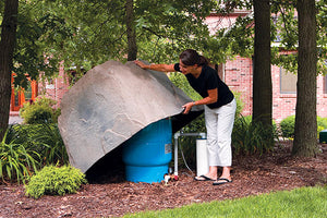 Large Faux Rock Model 104 protecting large tank