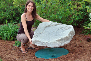 Low Profile Faux Rock Model 108 in flower bed