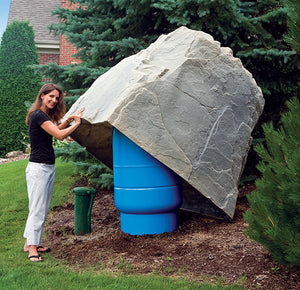 Extra Large High Profile Faux Rock Model 114 protecting large tank in yard