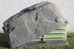 DekoRRa Artificial Rock Model 117 in Fieldstone color protecting electrical box