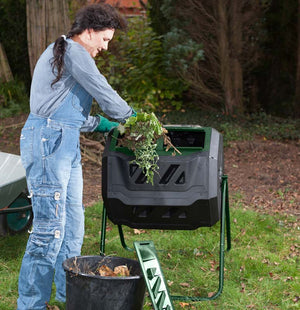 adding yard waste to Mr.Spin® Compost Tumbler