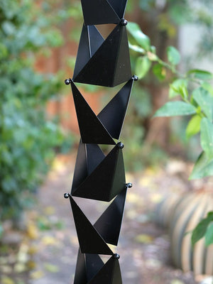 origami rain chain on home