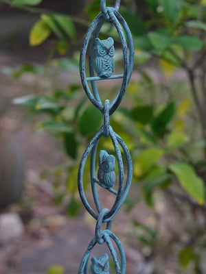 multiple oval links in the Owl Rain Chain in Patina finish