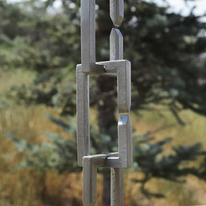 Close up of Rectangle Links Rain Chain in clear powder-coated aluminum