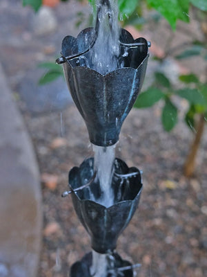 Copper Patina XL Scallop Cups Rain Chain with water flowing through cups